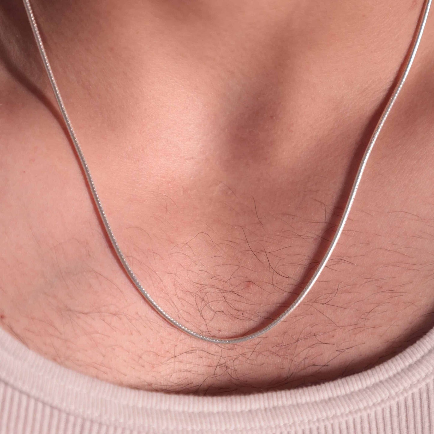 This image features a original silver snake chain necklace, The timeless design makes it a versatile neck accessory for men or boy.