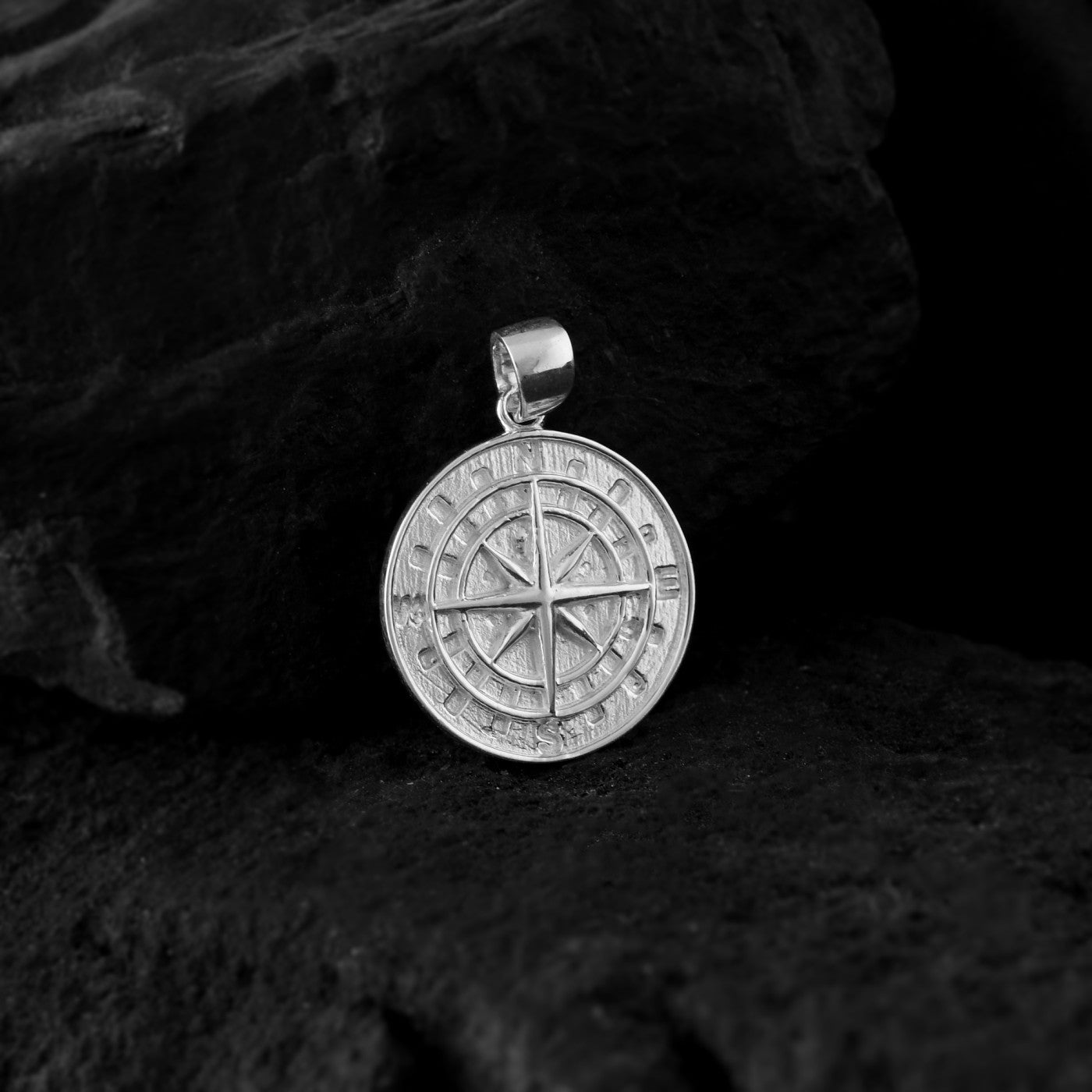 This intricate pure silver pendant for men features a compass, a timeless symbol of guidance, direction, and finding your way. 