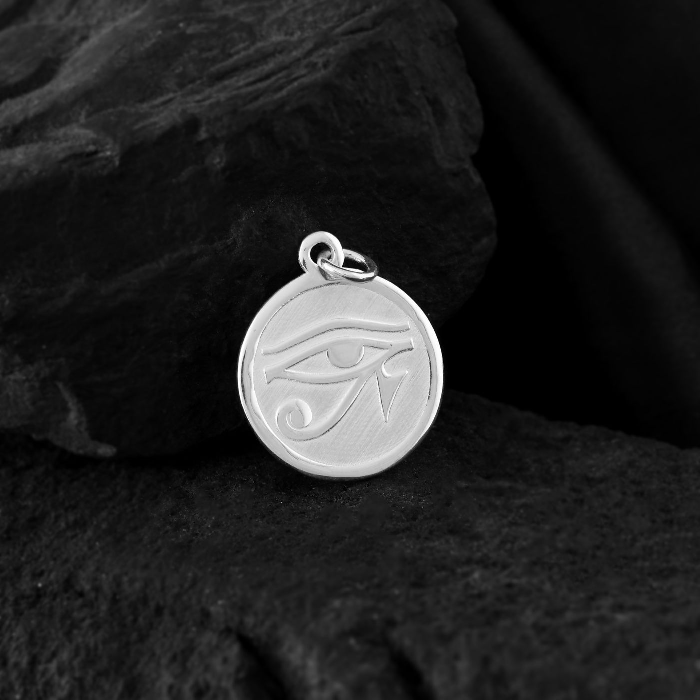 Ward off evil with this gleaming silver Eye of Ra pendant. This symbol of ancient Egyptian power brings good health, wisdom, and protects its wearer