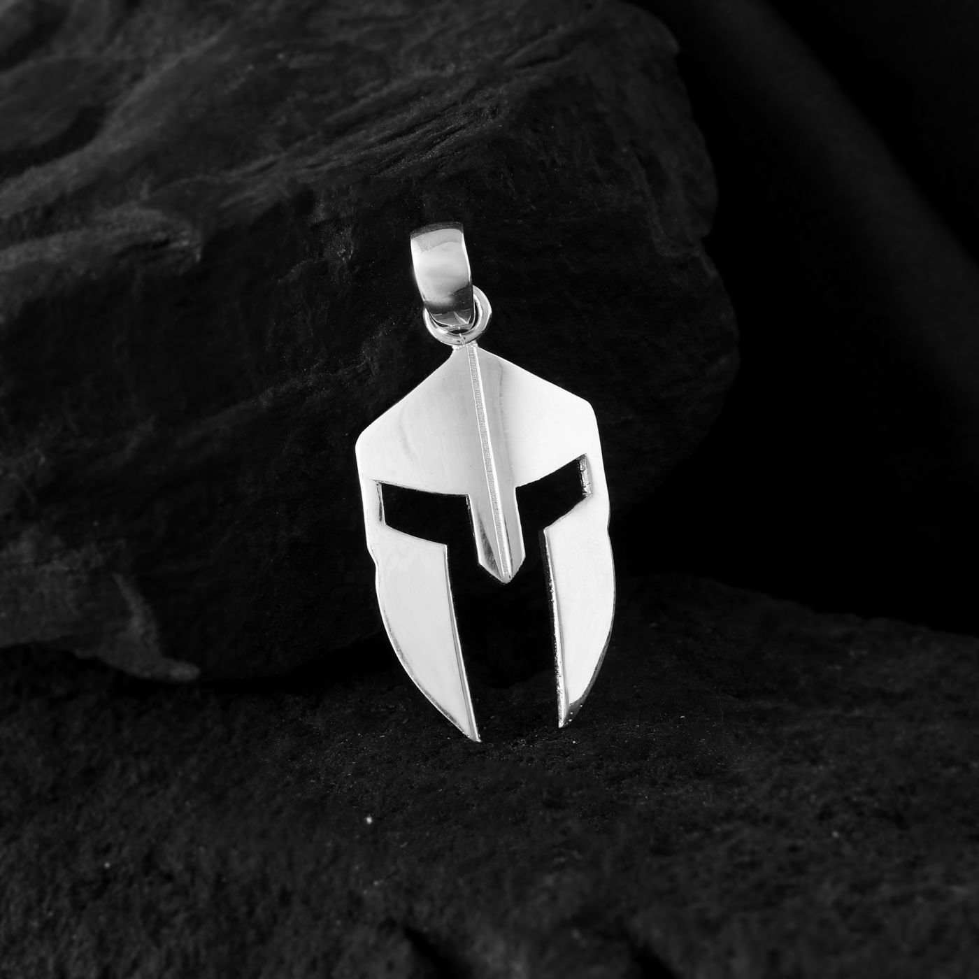 A close-up view of a Spartan helmet pendant in 925 sterling silver. A perfect gift for the man who appreciates understated elegance.