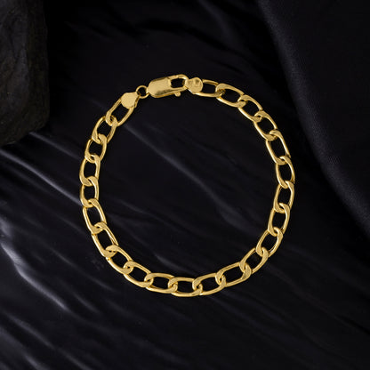 Close-up view of a gold chain bracelet for men. The elegant piece of jewelry features a polished finish and a timeless design. 