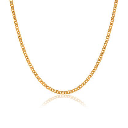 A close-up photo of a gold chain necklace for men. The thin cuban chain has a shiny finish and reflects light on a white background. 