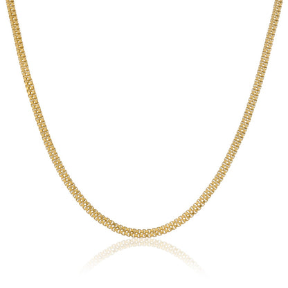 A close-up photo of a double box gold plated silver chain. This type of chain is popular in India for gold plated jewellery for men