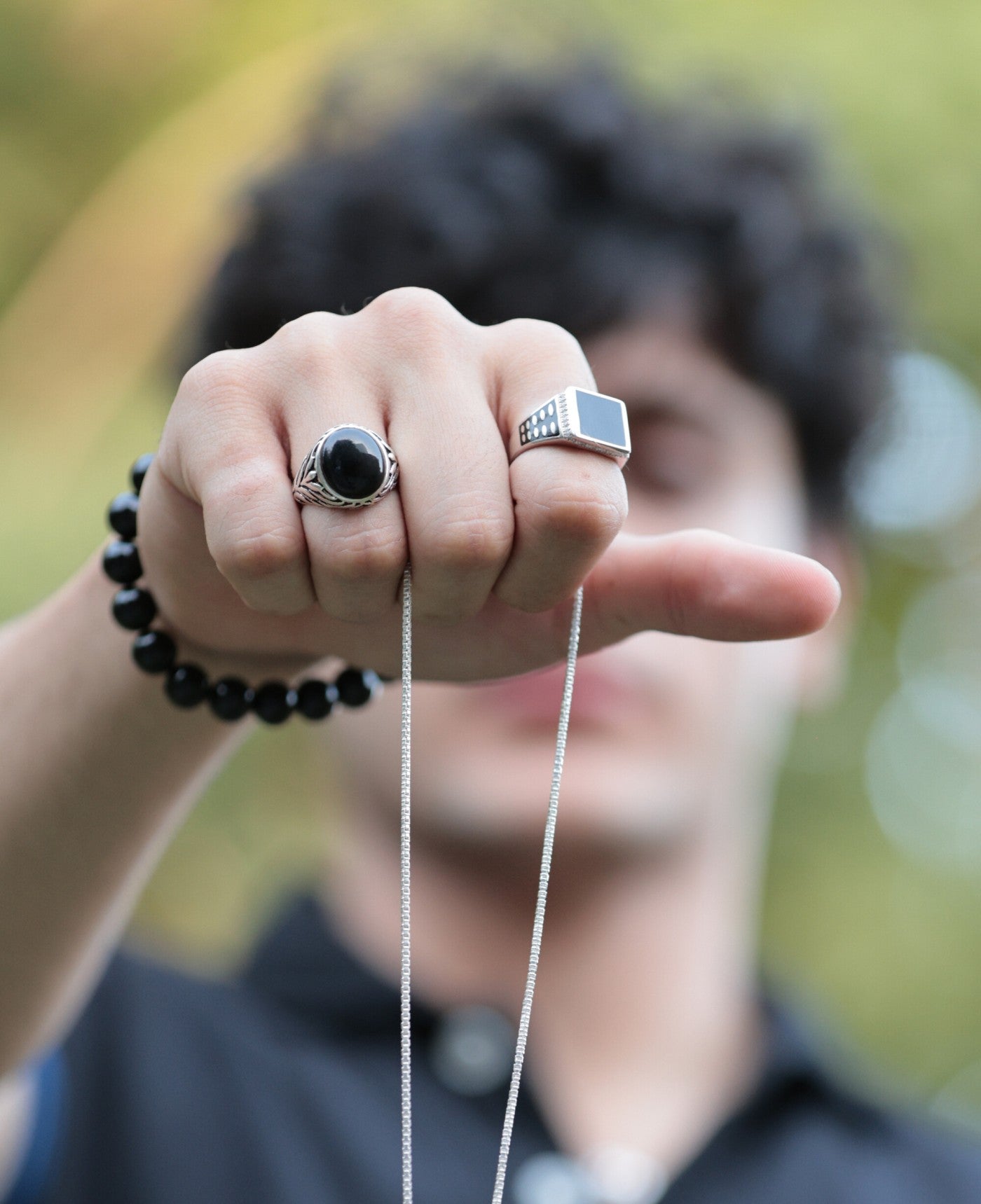 This men's fashion ring is made of sterling silver and features a black onyx stone. The simple yet elegant design makes it a great gift for any man.